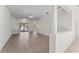 Open living area with hardwood floors and built-in shelving at 4109 W Platt St, Tampa, FL 33609