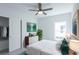 Spacious bedroom with large window, walk-in closet, and dresser at 475 Winwood Ct, Port Charlotte, FL 33954