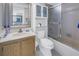 Well-lit bathroom with a vanity, mirrored wall cabinet, toilet, and shower-tub combination, perfect for everyday living at 6287 Bahia Del Mar Cir # 603, St Petersburg, FL 33715