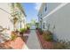 Landscaped walkway between two houses at 8423 Blue Rock Dr, New Port Richey, FL 34653