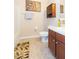 Well-maintained bathroom featuring shower and tile flooring at 8423 Blue Rock Dr, New Port Richey, FL 34653