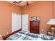 Bedroom with a double bed, dresser, and closet at 8423 Blue Rock Dr, New Port Richey, FL 34653
