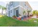 Private backyard with small patio and lawn at 8423 Blue Rock Dr, New Port Richey, FL 34653