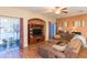Spacious living room with sectional sofa and wood floors at 8423 Blue Rock Dr, New Port Richey, FL 34653