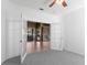 Bedroom with French doors opening to the dining room at 1012 Tuscanny St, Brandon, FL 33511