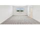 Spacious bedroom with neutral carpet and double windows at 10328 Cross River Trl, Parrish, FL 34219