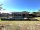Private backyard with a screened pool and patio area at 11253 Leland St, Spring Hill, FL 34609