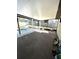 Spacious screened patio with pool access and a large covered area at 11253 Leland St, Spring Hill, FL 34609