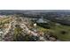 Aerial view of house and neighborhood, near golf course and lake at 12922 Prestwick Dr, Riverview, FL 33579