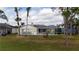 Home with a screened pool and fenced backyard at 12922 Prestwick Dr, Riverview, FL 33579