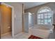 Bathroom with shower, bathtub, and updated vanity at 12922 Prestwick Dr, Riverview, FL 33579