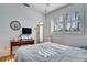 Bright bedroom with wood floors and private access at 12922 Prestwick Dr, Riverview, FL 33579