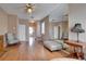 Bedroom with hardwood floors and access to a back patio at 12922 Prestwick Dr, Riverview, FL 33579