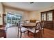 Bright dining room with hardwood floors and access to the pool at 12922 Prestwick Dr, Riverview, FL 33579