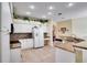 Spacious kitchen with granite countertops and white cabinets at 12922 Prestwick Dr, Riverview, FL 33579