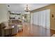 Open living room and kitchen area with hardwood floors at 12922 Prestwick Dr, Riverview, FL 33579
