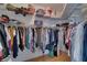 Large walk-in closet with ample shelving and hanging space at 12922 Prestwick Dr, Riverview, FL 33579