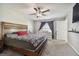 Main bedroom with king-size bed and access to additional space at 13541 Wild Ginger St, Riverview, FL 33579