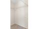 Walk-in closet with wire shelving at 13928 Noble Park Dr, Odessa, FL 33556