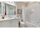 Clean bathroom with white tile and bathtub at 15314 Valencia Del Sol St, Wimauma, FL 33598