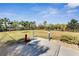 A spacious dog park with various play structures and amenities for pets to enjoy at 15314 Valencia Del Sol St, Wimauma, FL 33598