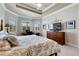 Main bedroom with king bed and dresser at 15314 Valencia Del Sol St, Wimauma, FL 33598