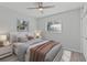 Bright bedroom with ceiling fan and neutral decor at 2085 Georgianna St, Largo, FL 33774