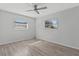 Bedroom with wood-look flooring and neutral-toned walls at 2085 Georgianna St, Largo, FL 33774