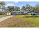 Newly renovated house with landscaped front yard at 2085 Georgianna St, Largo, FL 33774