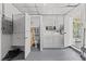Laundry room with washer, dryer, and extra storage at 2085 Georgianna St, Largo, FL 33774