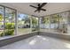 Spacious sunroom offering ample natural light and backyard access at 2085 Georgianna St, Largo, FL 33774