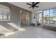 Bright sunroom with sliding glass doors leading outdoors at 2085 Georgianna St, Largo, FL 33774
