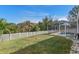 Spacious backyard with grassy area and pool at 22921 Sterling Manor Loop, Lutz, FL 33549