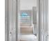 Bathroom with a bathtub and a stained-glass window at 22921 Sterling Manor Loop, Lutz, FL 33549