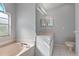 Bathroom with double sinks and a toilet at 22921 Sterling Manor Loop, Lutz, FL 33549