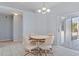 Cozy dining area with a round table and four chairs at 22921 Sterling Manor Loop, Lutz, FL 33549