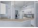 Updated kitchen with stainless steel appliances and breakfast bar at 22921 Sterling Manor Loop, Lutz, FL 33549