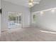 Spacious main bedroom with sliding doors to the pool at 22921 Sterling Manor Loop, Lutz, FL 33549