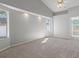 Spacious main bedroom with high ceilings and carpet at 22921 Sterling Manor Loop, Lutz, FL 33549