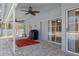 Covered patio with pavers, ceiling fan, and grill at 22921 Sterling Manor Loop, Lutz, FL 33549