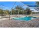 Screened pool and patio with paver deck at 22921 Sterling Manor Loop, Lutz, FL 33549