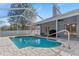 Refreshing pool with covered lanai and patio at 22921 Sterling Manor Loop, Lutz, FL 33549
