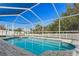Inviting screened pool area with paver deck at 22921 Sterling Manor Loop, Lutz, FL 33549