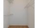 Large walk-in closet with wire shelving at 22921 Sterling Manor Loop, Lutz, FL 33549