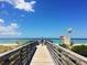 Convenient beach access via a boardwalk path at 2400 Winding Creek Blvd # 24-203, Clearwater, FL 33761
