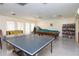Community recreation room with ping pong and billiards at 2400 Winding Creek Blvd # 24-203, Clearwater, FL 33761