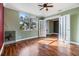 Living room with wood floors and French doors at 3306 N Howard Ave, Tampa, FL 33607