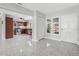 Bright living room blends seamlessly with a modern, updated kitchen at 6500 7Th S Way, St Petersburg, FL 33705