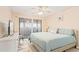 King-size bedroom with private balcony access at 804 Golf Island Dr, Apollo Beach, FL 33572