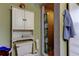 Small bathroom with shower stall, toilet, and cabinet at 81 Gulfwinds Dr, Palm Harbor, FL 34683